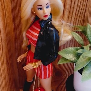 Stylish Doll with Red Outfit and Black Jacket